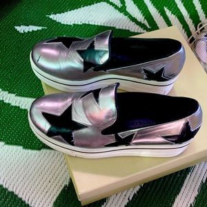 AUTHENTIC STELLA MCCARTNEY BLACK STARRED SILVER CASUAL DLIP ONS